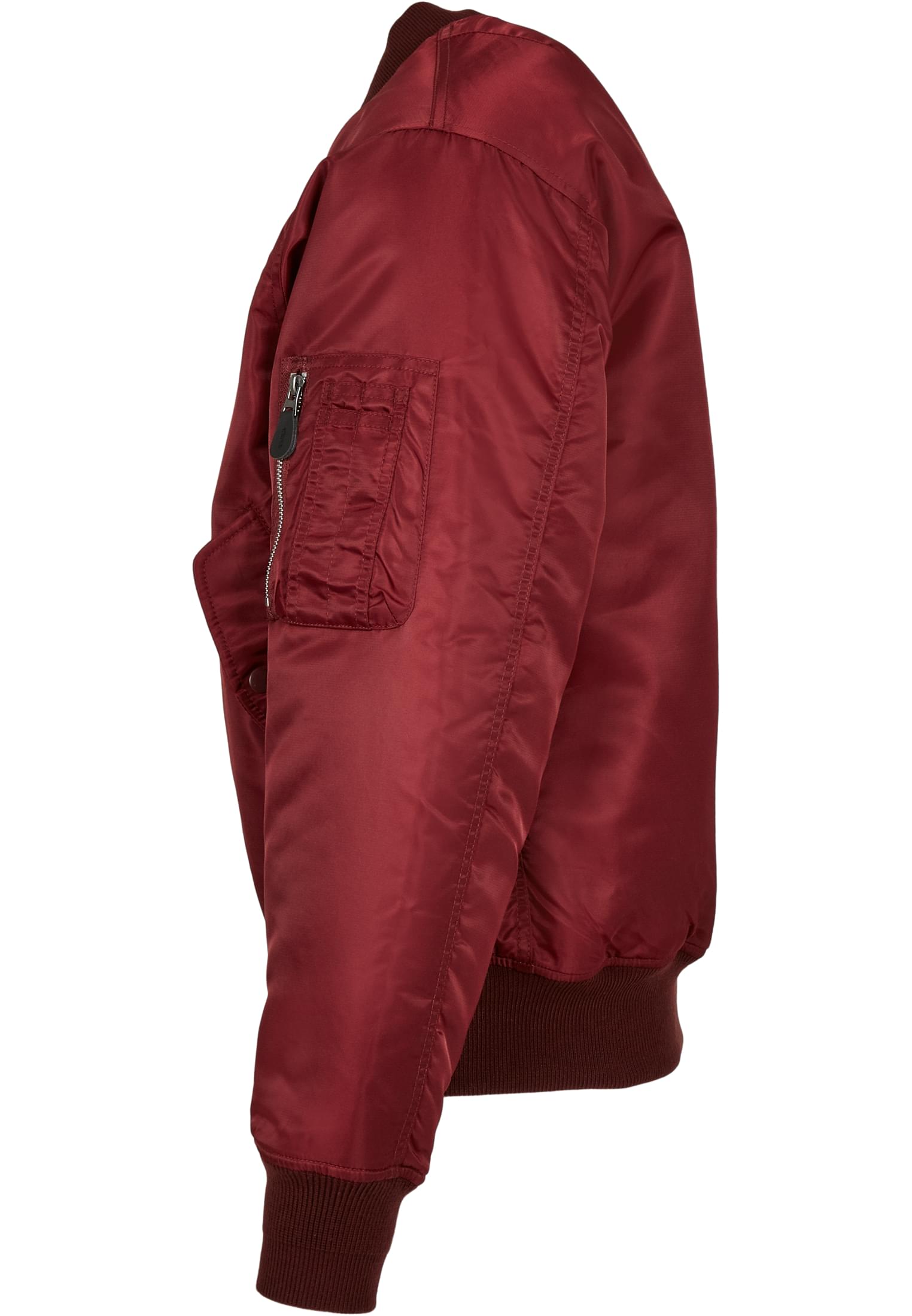 En röd B MA1 bomberjacka visad från sidan.