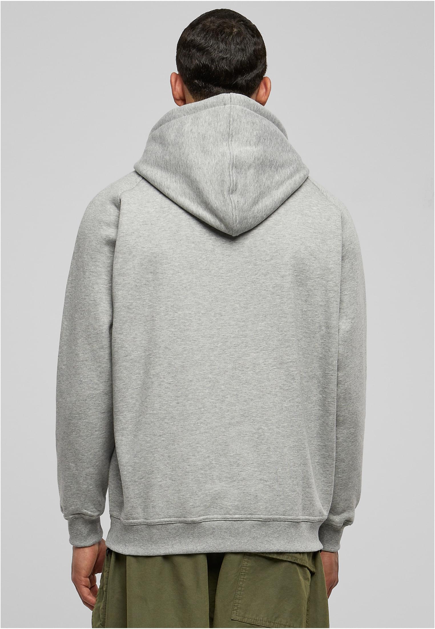 Baksidan av en man som bär en grå Blank Hoody.