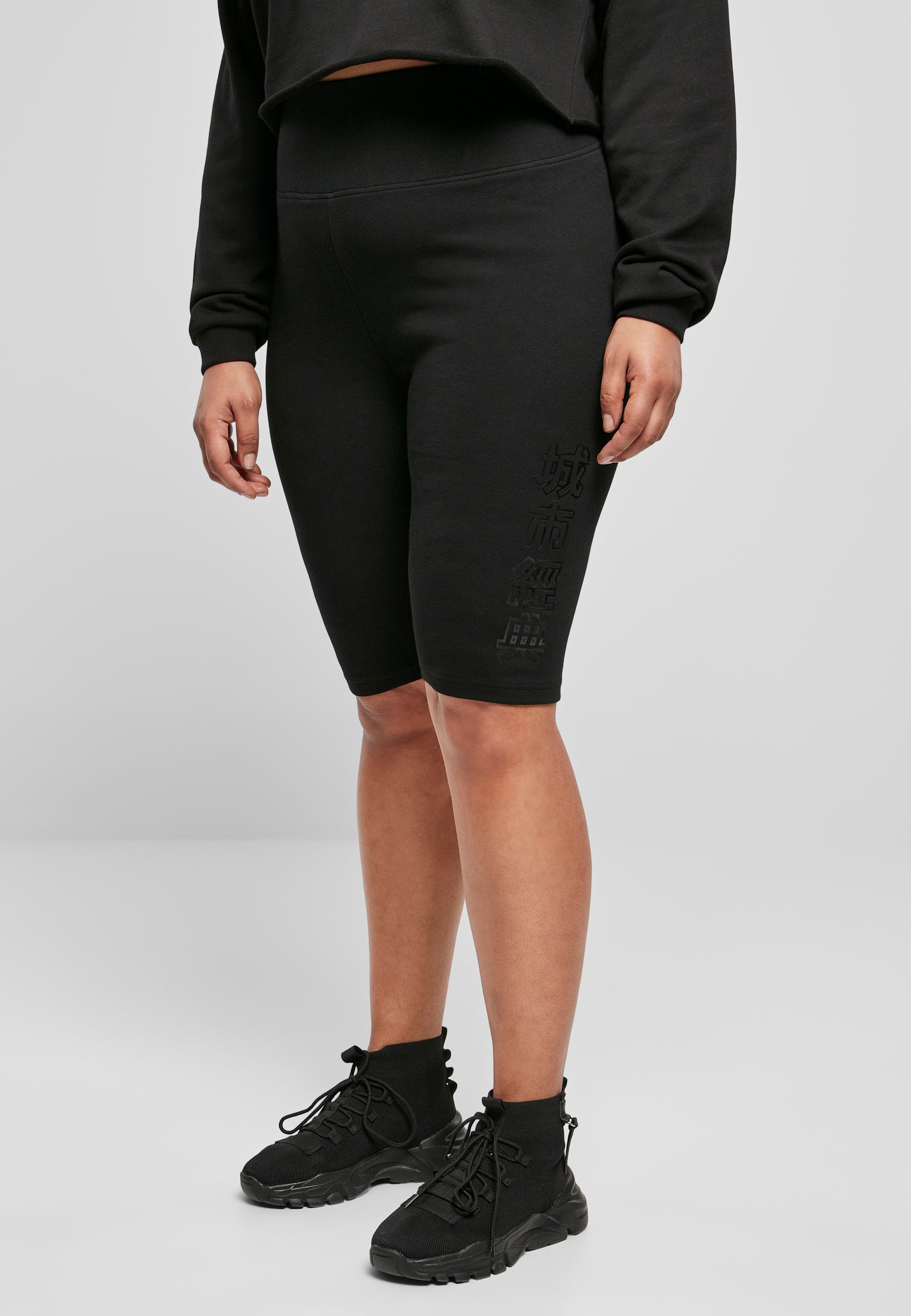 Pantaloncini da ciclista a vita alta con marchio UC