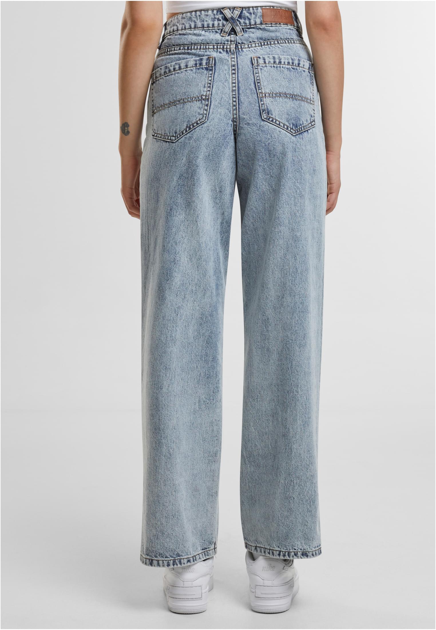 Jeans a gamba larga con spacchi UC