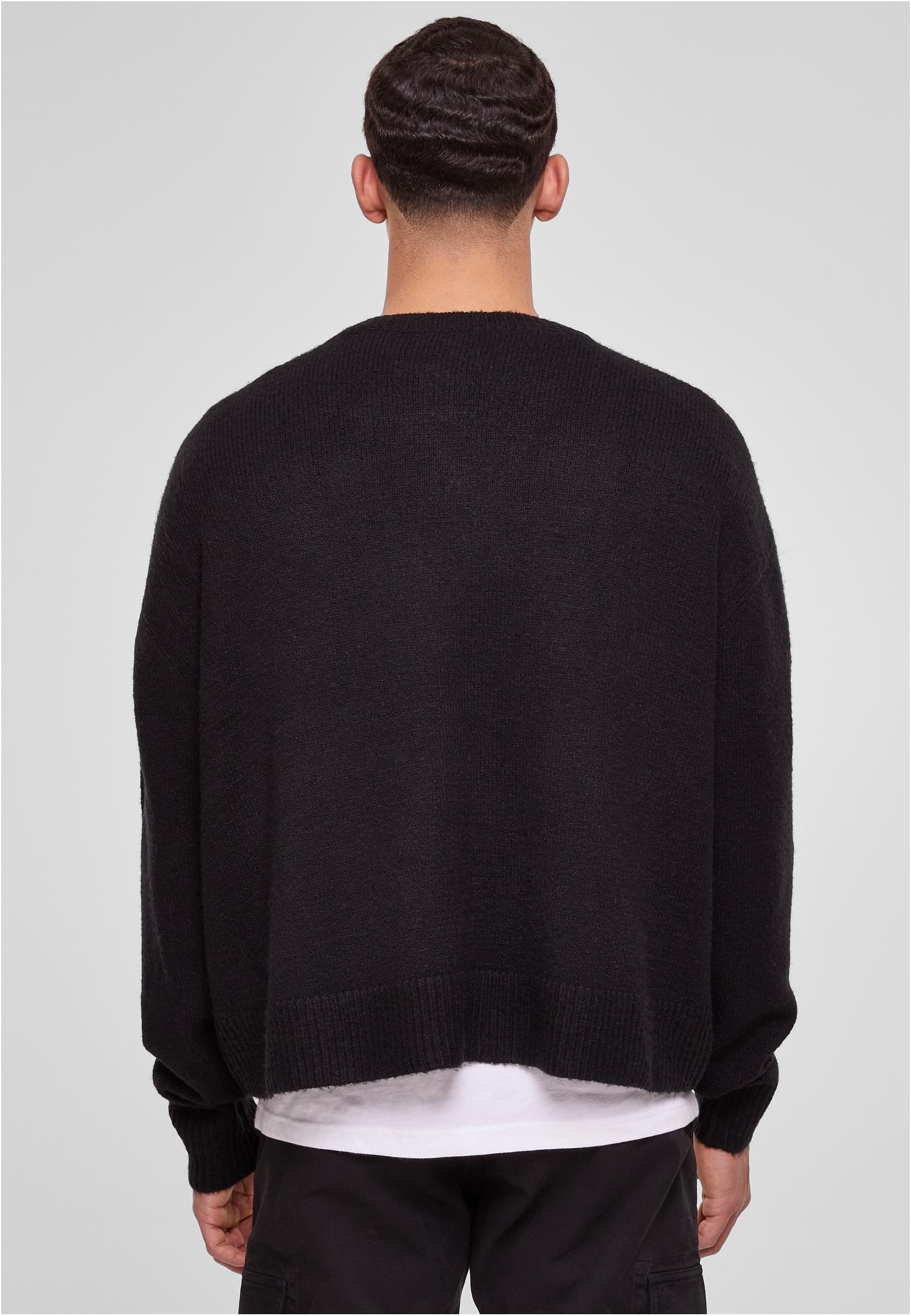 Kardigan z inicjałami UC