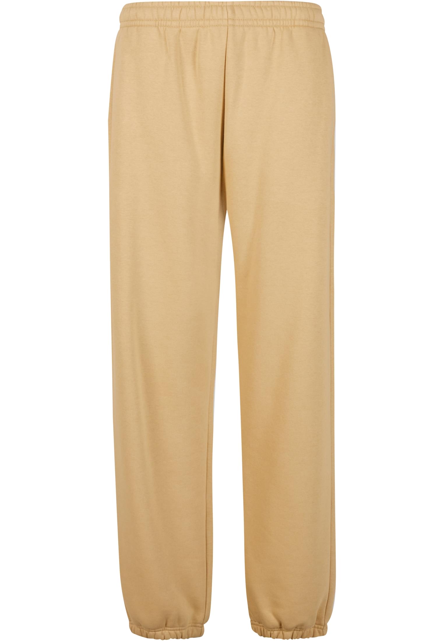 Ett par beiga Fluffy Sweatpants fotograferade framifrån mot en vit bakgrund.