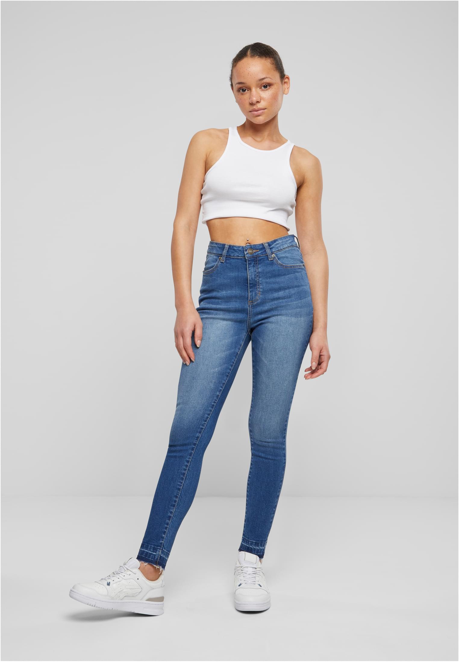Jeans skinny a vita alta con orlo aperto da donna UC