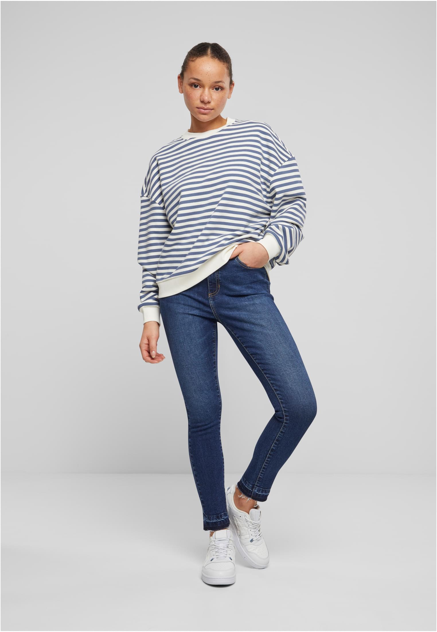 Jeans skinny a vita alta con orlo aperto da donna UC