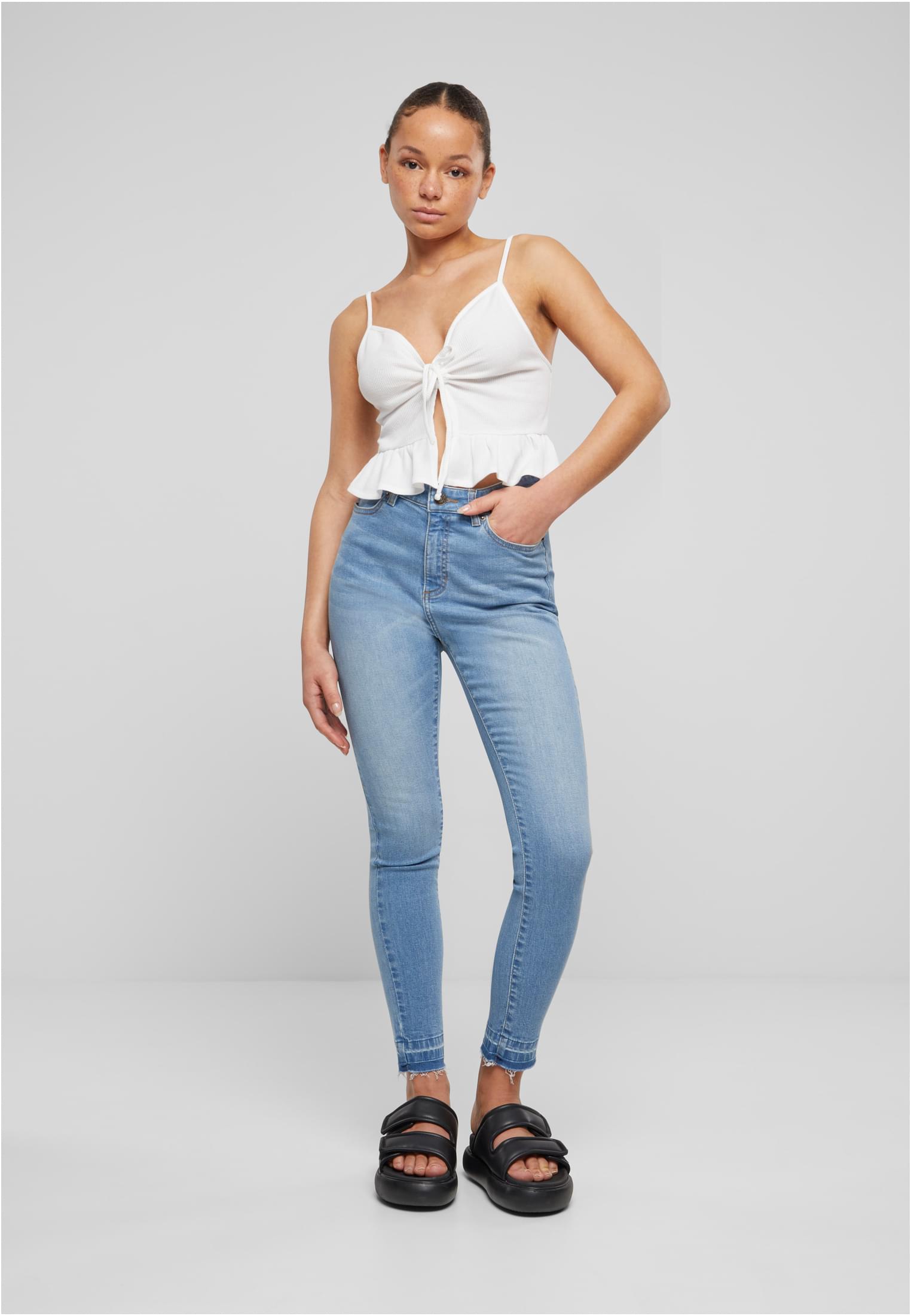 Jeans skinny a vita alta con orlo aperto da donna UC