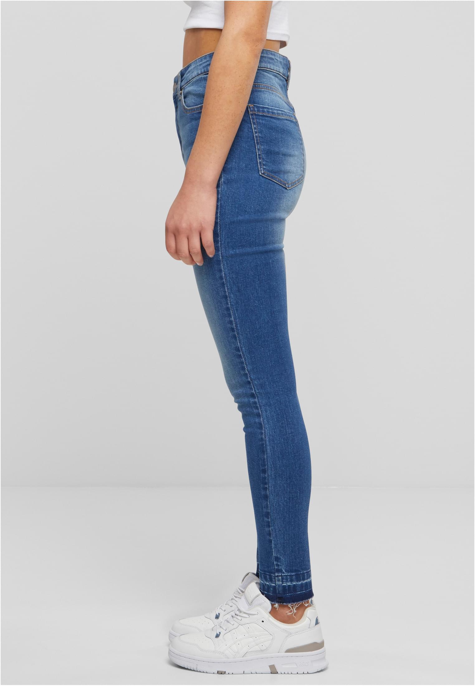Jeans skinny a vita alta con orlo aperto da donna UC