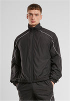 UC Trainingsjacke mit Paspelierung