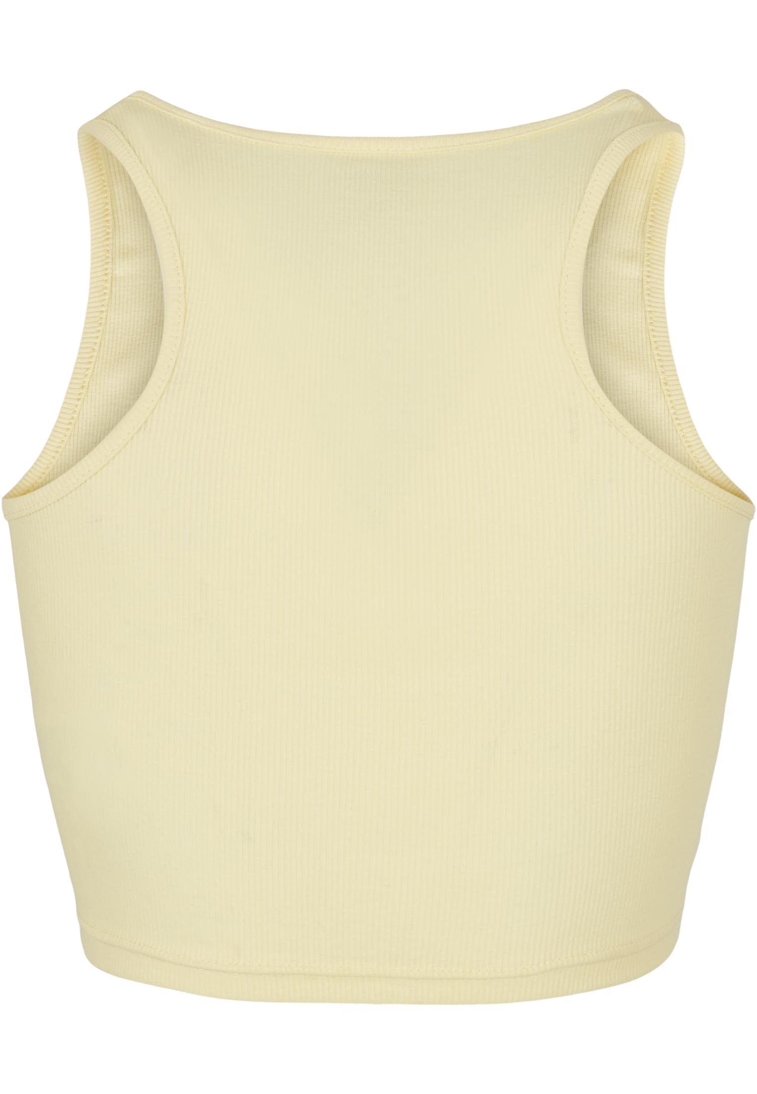 Baksidan av ett kort, ribbstickat linne i en ljusgul nyans.