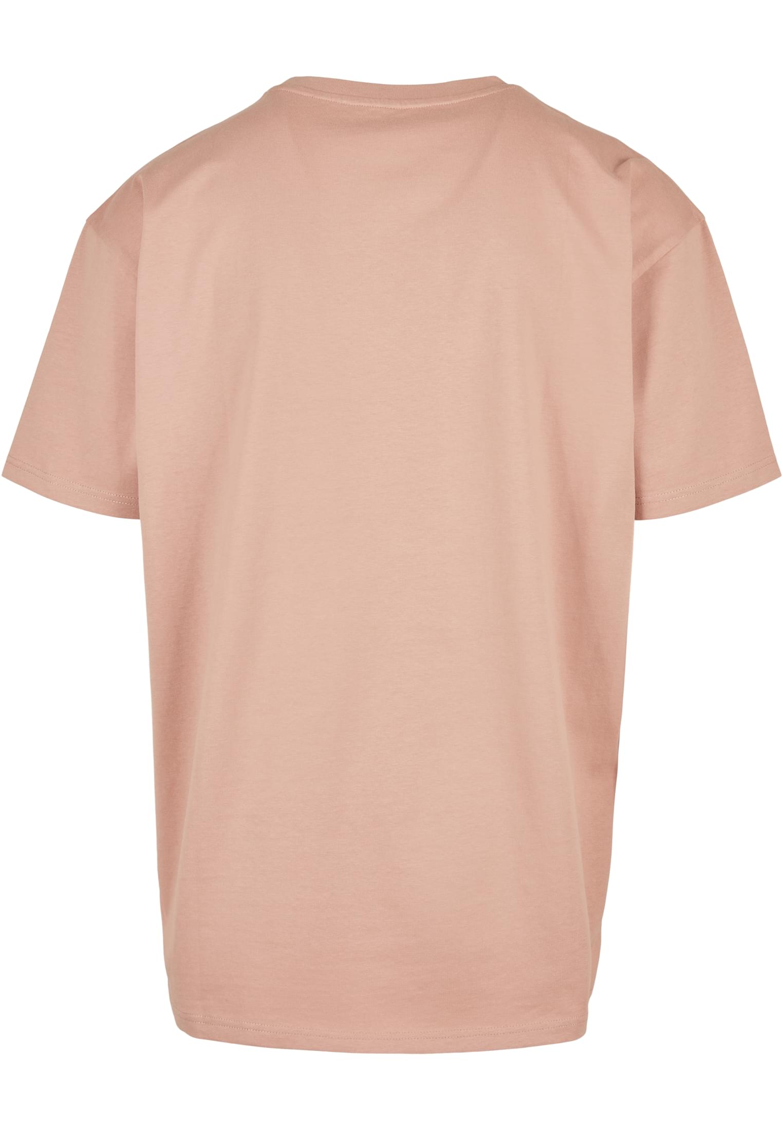 Baksidan av en ljusrosa, oversized t-shirt för män.