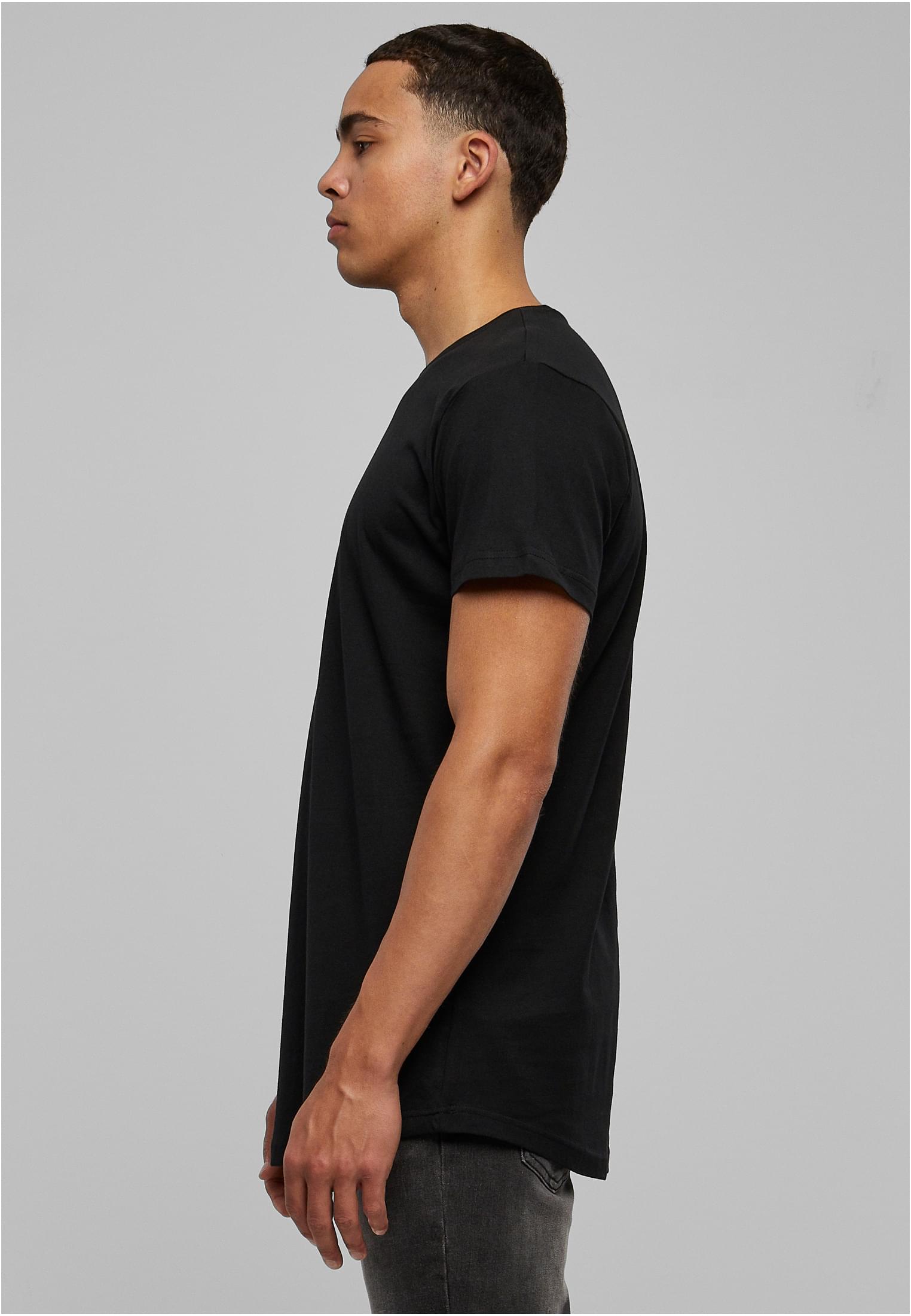 Manlig modell sedd från sidan, iklädd en svart UC Shaped Long Tee.