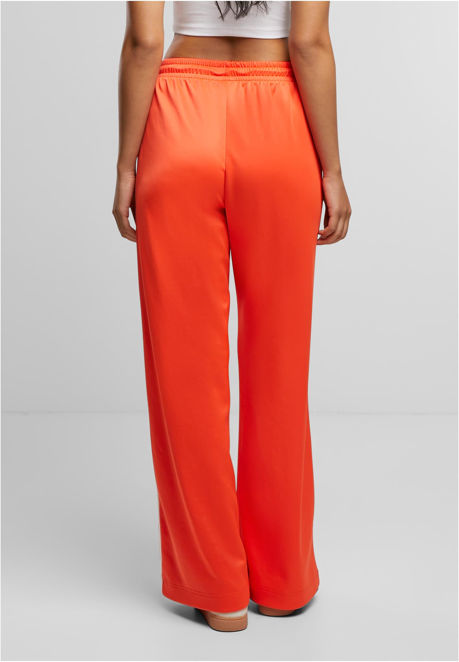 Calças de corrida de perna larga da UC