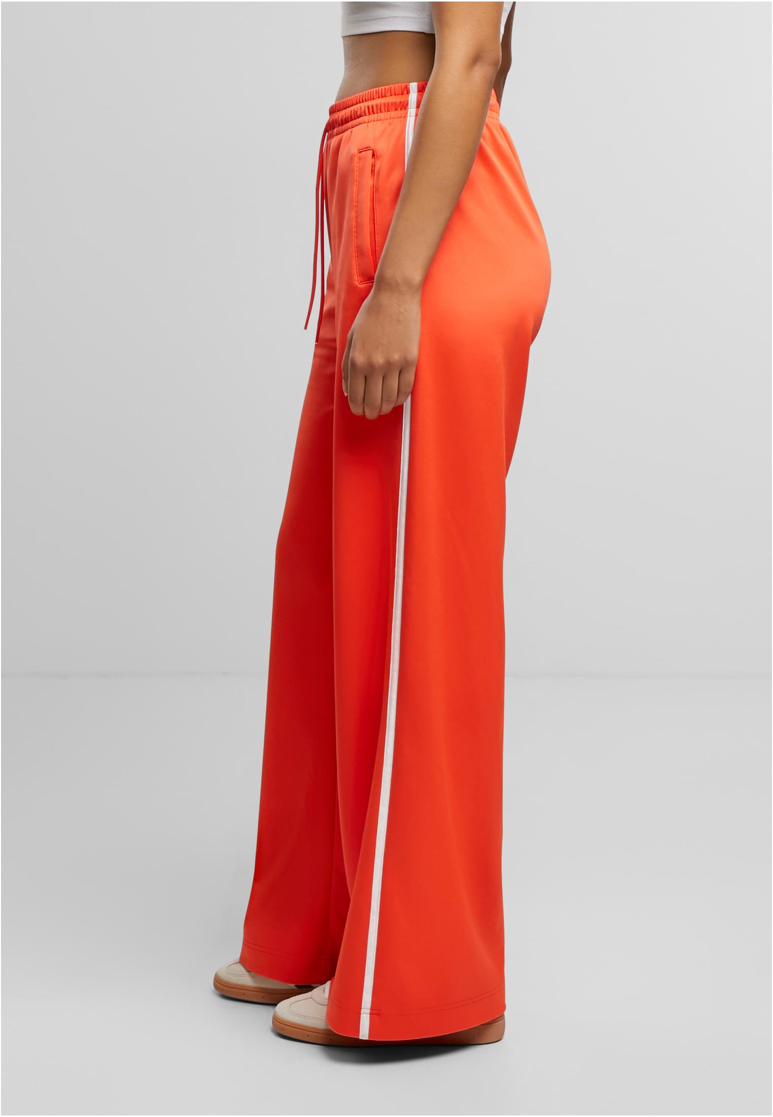 Calças de corrida de perna larga da UC