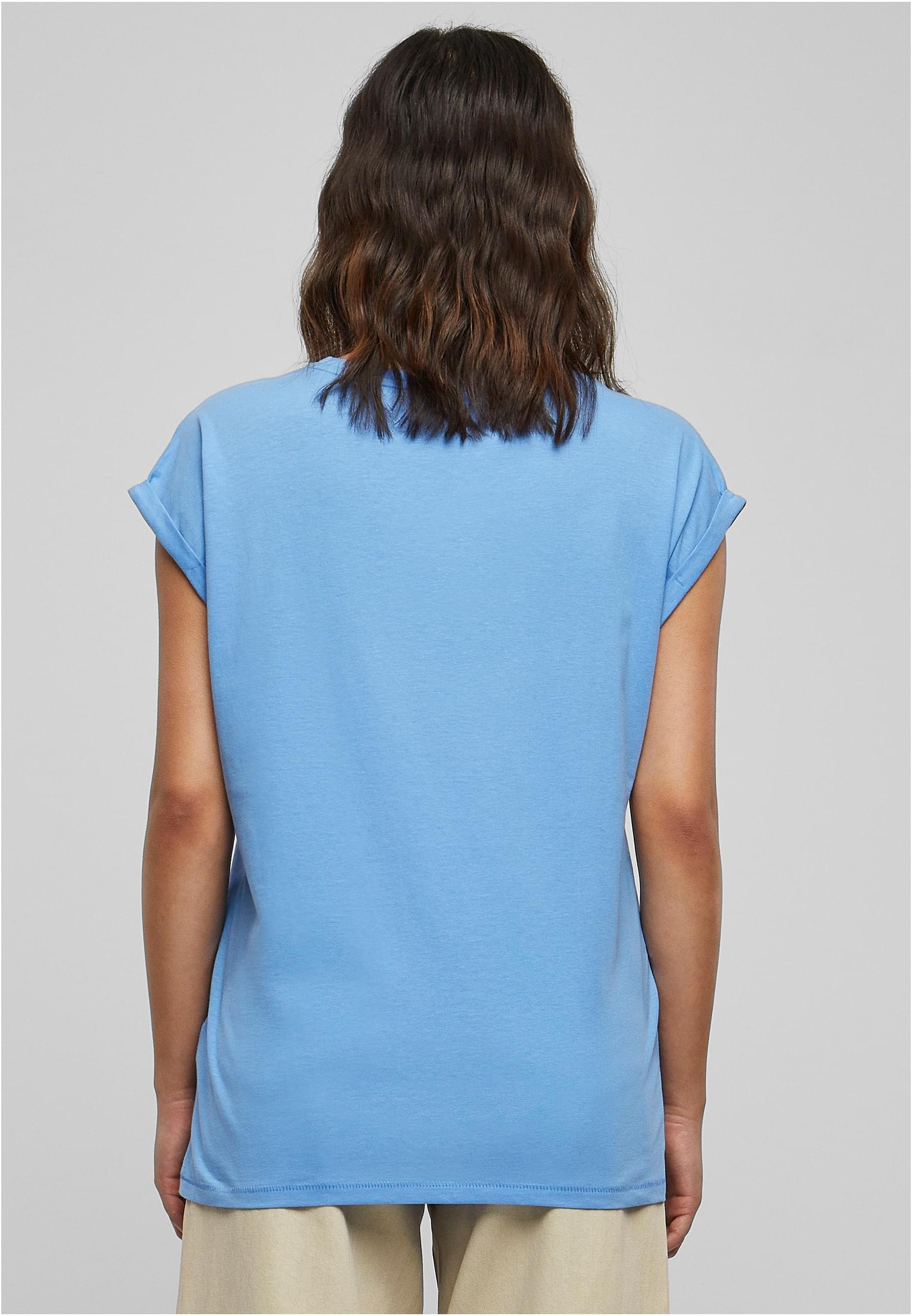 Baksidan av en kvinna som bär t-shirten Ladies Extended Shoulder Tee i färgen frostmint.