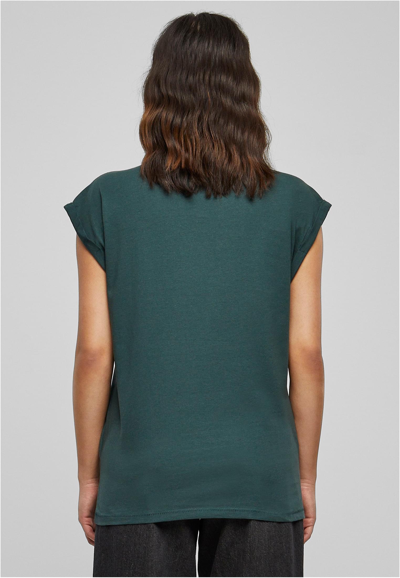 Baksidan av en modell som bär Ladies Extended Shoulder Tee i färgen frostmint.