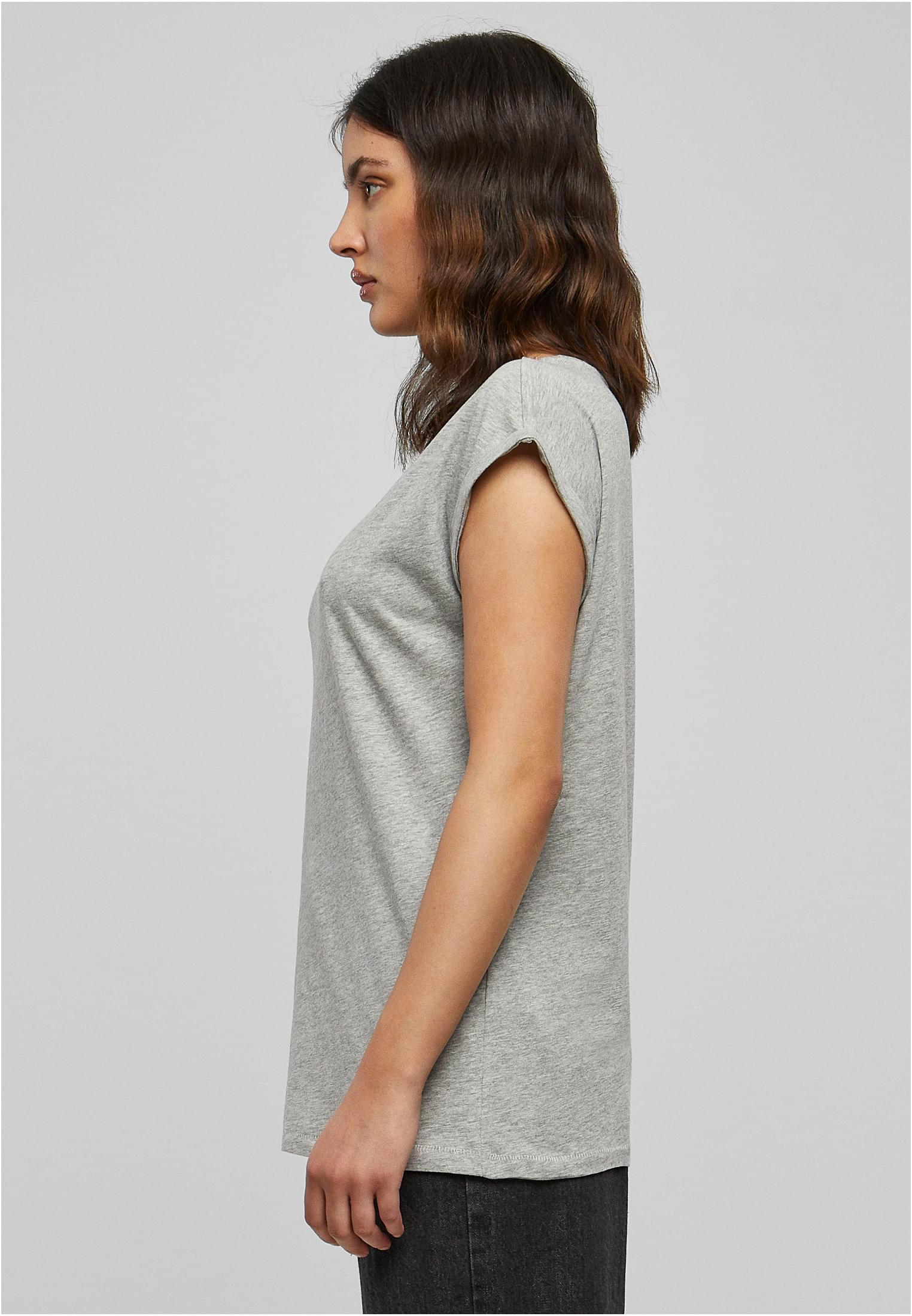 Sidovy av en kvinna som bär en grå Ladies Extended Shoulder t-shirt.