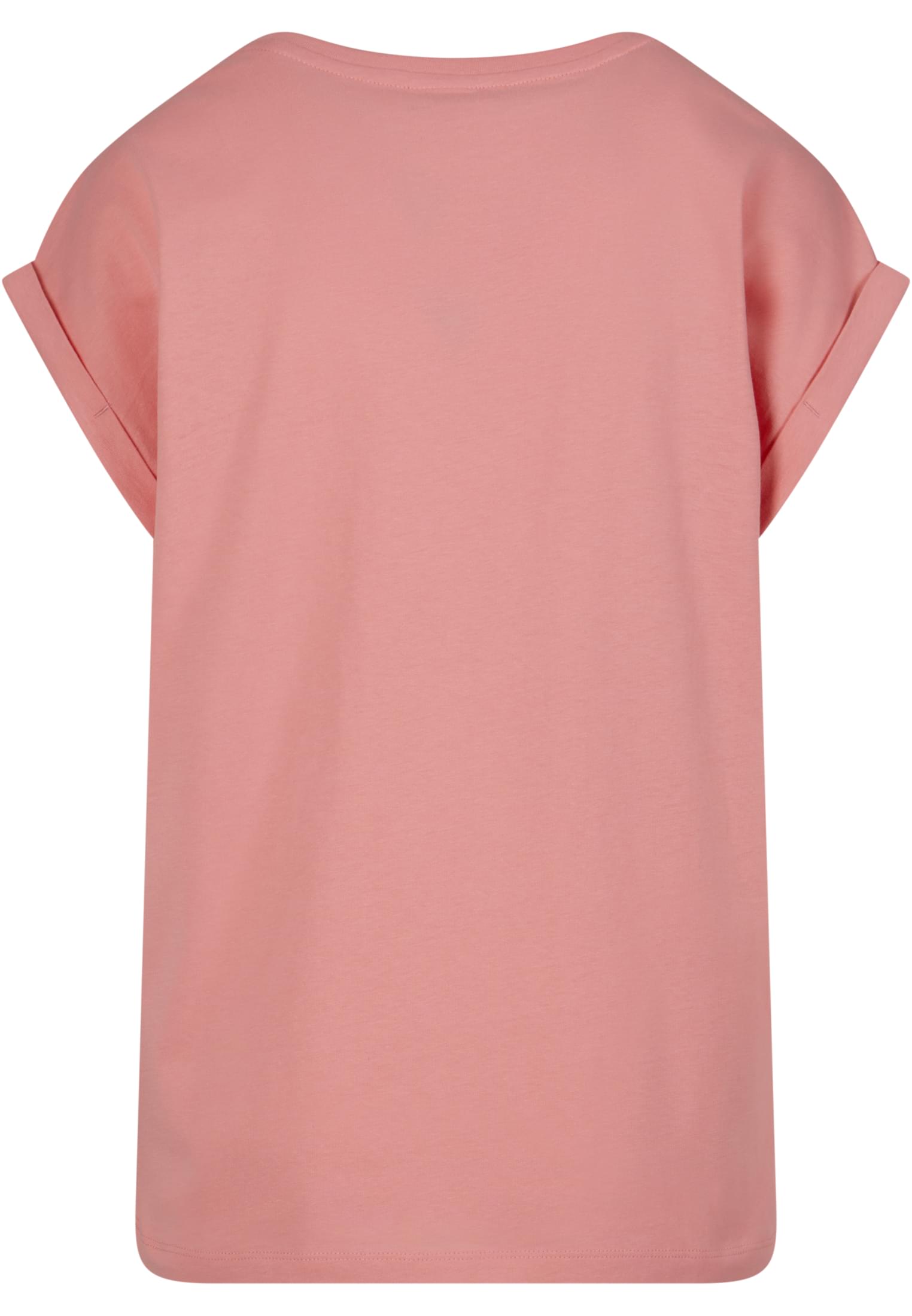 Baksidan av en frostmint-färgad t-shirt för damer med nedhasade axlar och uppvikta ärmar.