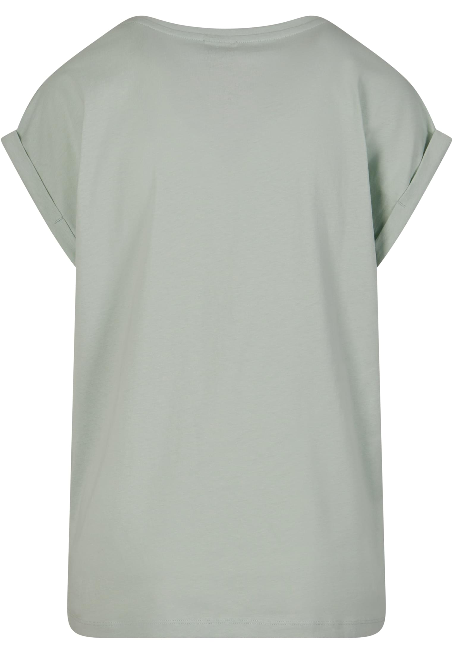 Baksidan av en mintgrön Ladies Extended Shoulder Tee med uppvikta ärmar.